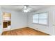 Empty bedroom with hardwood floors and beadboard walls ready for personalization at 256 Indian Trl, Marietta, GA 30068