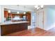 Kitchen with dark cabinets, granite countertops, and stainless steel appliances at 256 Indian Trl, Marietta, GA 30068