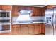 Kitchen features stainless steel appliances, modern cabinets, and granite countertops at 256 Indian Trl, Marietta, GA 30068