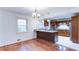 Kitchen with dark cabinets, granite countertops, and stainless steel appliances at 256 Indian Trl, Marietta, GA 30068