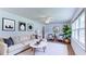 Bright living room featuring modern decor, hardwood floors, and ample natural light at 256 Indian Trl, Marietta, GA 30068