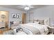 Bright main bedroom with ensuite bathroom, bench, and neutral decor at 256 Indian Trl, Marietta, GA 30068