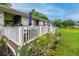 Beautiful backyard deck offering ample space for seating, complemented by lush greenery and outdoor enjoyment at 27 Ansley Nw Way, Cartersville, GA 30121