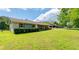 Inviting single-story home with a spacious front yard, attached carport, and a well-maintained exterior at 27 Ansley Nw Way, Cartersville, GA 30121