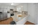 Charming kitchen with granite countertops and stainless steel appliances at 27 Ansley Nw Way, Cartersville, GA 30121