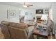 Inviting living room with a cozy fireplace, plush seating, and open floor plan at 27 Ansley Nw Way, Cartersville, GA 30121
