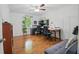 Bright home office featuring hardwood floors, a ceiling fan, and ample workspace for productivity at 27 Ansley Nw Way, Cartersville, GA 30121