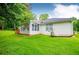 Backyard shot of home with grassy area and back porch at 6328 Wellington Ct, Douglasville, GA 30134