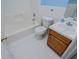 Bathroom featuring a vanity sink, toilet and tub-shower combo at 6328 Wellington Ct, Douglasville, GA 30134