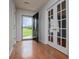 Inviting foyer with gleaming hardwood floors and bright natural light at 6328 Wellington Ct, Douglasville, GA 30134