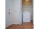 Functional laundry area with white appliances at 6328 Wellington Ct, Douglasville, GA 30134