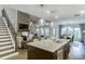 Open kitchen with a view of the dining room and living room, offering modern living at 7070 Concord Mountain Trl, Cumming, GA 30028