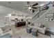 Open concept living room with hardwood floors and staircase leading to upper level at 7070 Concord Mountain Trl, Cumming, GA 30028