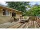 Spacious deck with comfortable seating, ideal for relaxing and enjoying the outdoor scenery at 735 Waterbrook Ter, Roswell, GA 30076