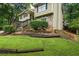 Well maintained, charming home with stone accents and lush landscaping in a wooded neighborhood at 735 Waterbrook Ter, Roswell, GA 30076