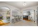 Open kitchen layout with breakfast bar overlooking other living spaces, creating an inviting atmosphere at 735 Waterbrook Ter, Roswell, GA 30076