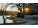 Scenic walking path along the lake at sunset at 735 Waterbrook Ter, Roswell, GA 30076