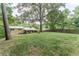 Spacious backyard featuring mature trees and well-maintained lawn, creating a serene outdoor oasis at 2510 Brentwood Ct, Decatur, GA 30032