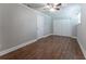 Bedroom features wood floors, natural light, and a spacious closet at 2510 Brentwood Ct, Decatur, GA 30032