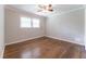 Bedroom featuring hardwood floors, a ceiling fan, a window and crown molding at 2510 Brentwood Ct, Decatur, GA 30032