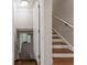 Stairwell with hardwood steps and trim and white risers, walls, and banisters at 2510 Brentwood Ct, Decatur, GA 30032
