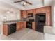 Updated kitchen featuring granite countertops, dark appliances, tile backsplash, and plenty of storage space at 2510 Brentwood Ct, Decatur, GA 30032