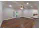Bright living room featuring hardwood floors, neutral walls, and large windows creating an inviting atmosphere at 2510 Brentwood Ct, Decatur, GA 30032
