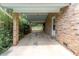 Covered patio area with brick pillars, offering shade and shelter for outdoor gatherings and relaxation at 2510 Brentwood Ct, Decatur, GA 30032