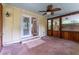 This screened in porch has a ceiling fan and access to the backyard at 2510 Brentwood Ct, Decatur, GA 30032
