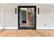 Inviting entryway with light brick floors, coat hooks, and direct staircase access at 260 Sandy Lake Cir, Fayetteville, GA 30214