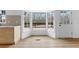 Bright kitchen area with modern cabinets and a scenic view through a bay window at 260 Sandy Lake Cir, Fayetteville, GA 30214