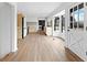 Open concept kitchen with modern appliances, a large window, and hardwood floors at 260 Sandy Lake Cir, Fayetteville, GA 30214