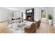 Bright living room with modern fireplace, stylish furniture, and natural light at 260 Sandy Lake Cir, Fayetteville, GA 30214