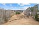 Tranquil landscape featuring a creek and trees at 260 Sandy Lake Cir, Fayetteville, GA 30214