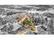 An aerial view shows estimated property lines, surrounded by trees and neighboring houses, near a lake at 260 Sandy Lake Cir, Fayetteville, GA 30214
