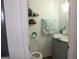 Charming bathroom with modern fixtures, stylish vanity, and ample storage space, creating a refreshing and functional space at 124 Wynn Rd, Mcdonough, GA 30252