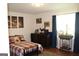 Cozy bedroom with a comfortable bed, elegant furnishings, and ample natural light, creating a peaceful and inviting space at 124 Wynn Rd, Mcdonough, GA 30252