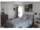 A bedroom with a comfy bed, soothing colors, and stylish decor at 124 Wynn Rd, Mcdonough, GA 30252