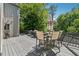 Wooden back deck with outdoor seating and a grill perfect for entertaining and relaxing at 4117 Signal Sw Rdg, Lilburn, GA 30047