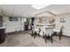 Finished basement includes a bar with modern decor, tiled carpet, and recessed lighting at 4117 Signal Sw Rdg, Lilburn, GA 30047