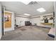 Finished basement with recessed lighting, textured carpet, built-in shelving, and vintage decor at 4117 Signal Sw Rdg, Lilburn, GA 30047