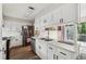 Bright kitchen featuring stainless steel appliances and white cabinets at 4117 Signal Sw Rdg, Lilburn, GA 30047