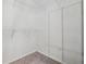 Walk-in closet with carpeted floors and white wire shelving for optimized storage solutions at 4117 Signal Sw Rdg, Lilburn, GA 30047