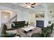 Inviting living room with a fireplace, plush seating, and modern decor at 7682 Baron Rd, Fairburn, GA 30213
