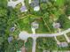 Aerial view of property with approximate lot lines and surrounding neighborhood at 1083 Wash Lee Sw Dr, Lilburn, GA 30047