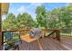 Back deck with grill, perfect for outdoor cooking and entertaining at 1083 Wash Lee Sw Dr, Lilburn, GA 30047