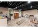 Finished basement with new flooring, natural light, and ample space for recreation or hobbies at 1083 Wash Lee Sw Dr, Lilburn, GA 30047