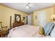 Charming bedroom featuring a ceiling fan and unique decorative trim at 1083 Wash Lee Sw Dr, Lilburn, GA 30047