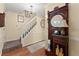 Warm foyer with hardwood floors and classic decor at 1083 Wash Lee Sw Dr, Lilburn, GA 30047
