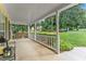 Spacious front porch with a swing and tasteful decor, perfect for relaxing outdoors at 1083 Wash Lee Sw Dr, Lilburn, GA 30047